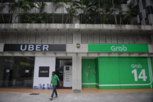 Singapore: Có cơ sở nghi ngờ vụ Grab mua Uber vi phạm luật