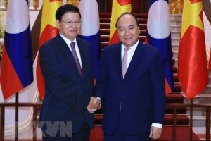 Thủ tướng Lào đến Việt Nam đồng chủ trì Kỳ họp Ủy ban Liên Chính phủ